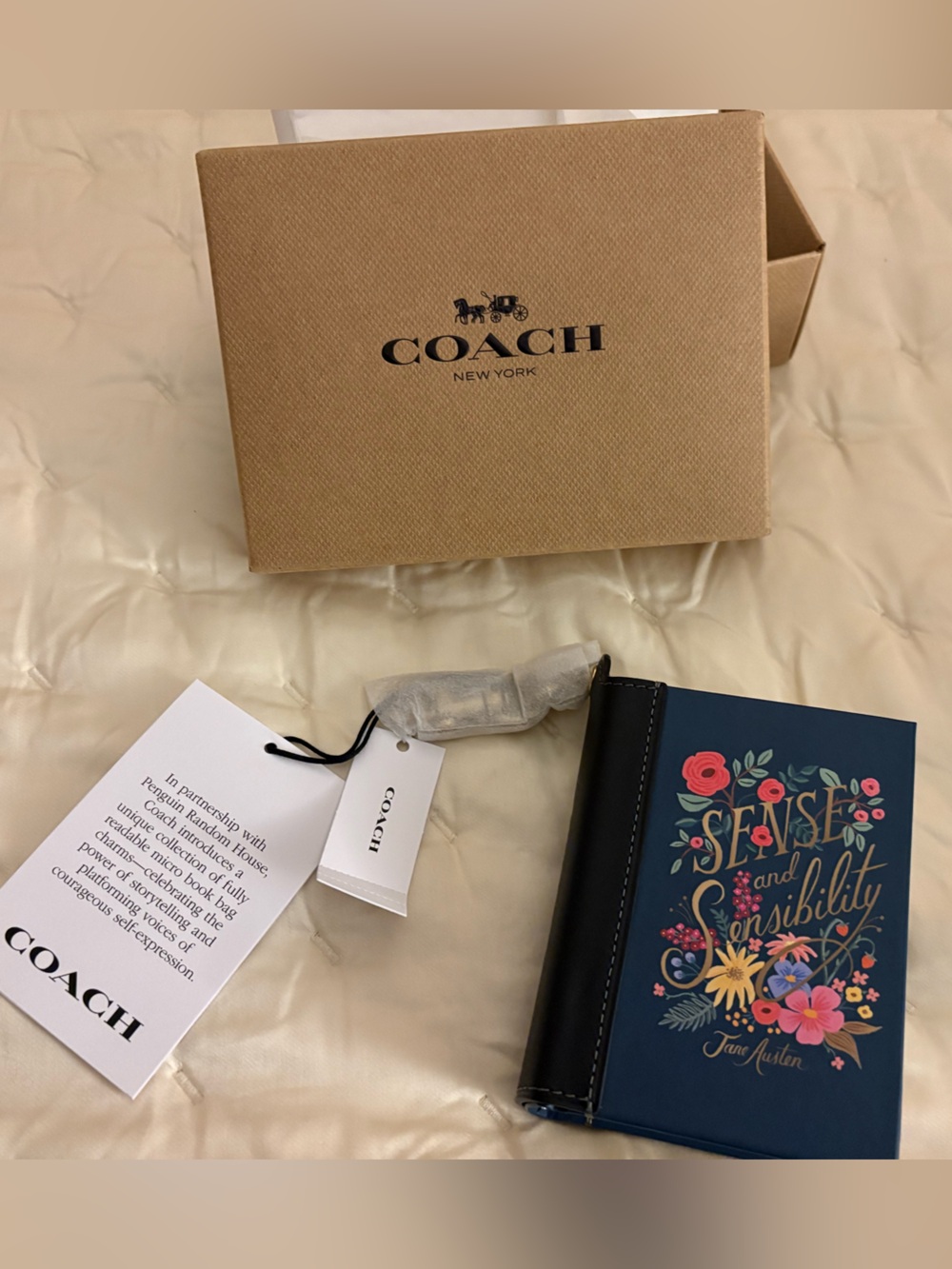 COACH LE Sense and Sensibility Book Charm NWT